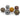 Six patterned balls are arranged on a white surface, each decorated with animal print designs.
