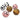 Six spherical objects with animal print patterns are arranged outdoors on a white surface.