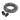 The shoelace is coiled with two plastic aglets nearby on a white surface.