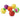 Colorful plastic fruits rotate inside their containers on a white surface.